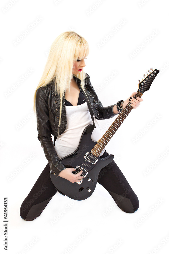 Sexy blonde girl rockstar playing black electric guitar Stock Photo | Adobe  Stock