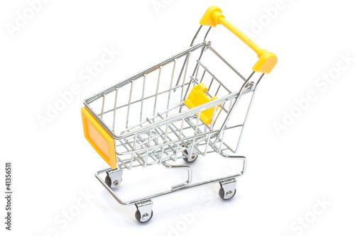 Yellow shopping cart on white
