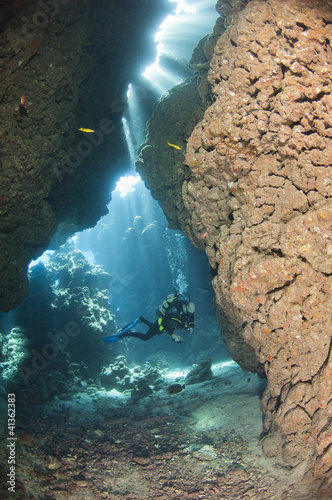 Scuba diver in an underwater cave © Paul Vinten
