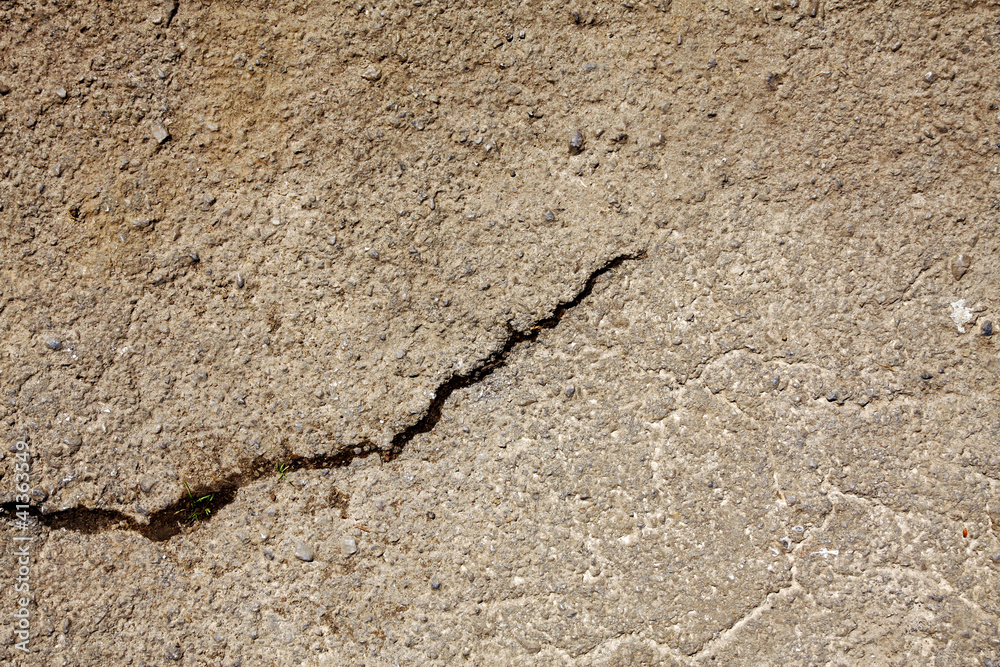 Fototapeta premium Cracked concrete path