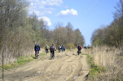 Cyclists riding on rural road