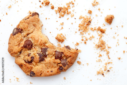 Close up of an half eaten cookie with crumb