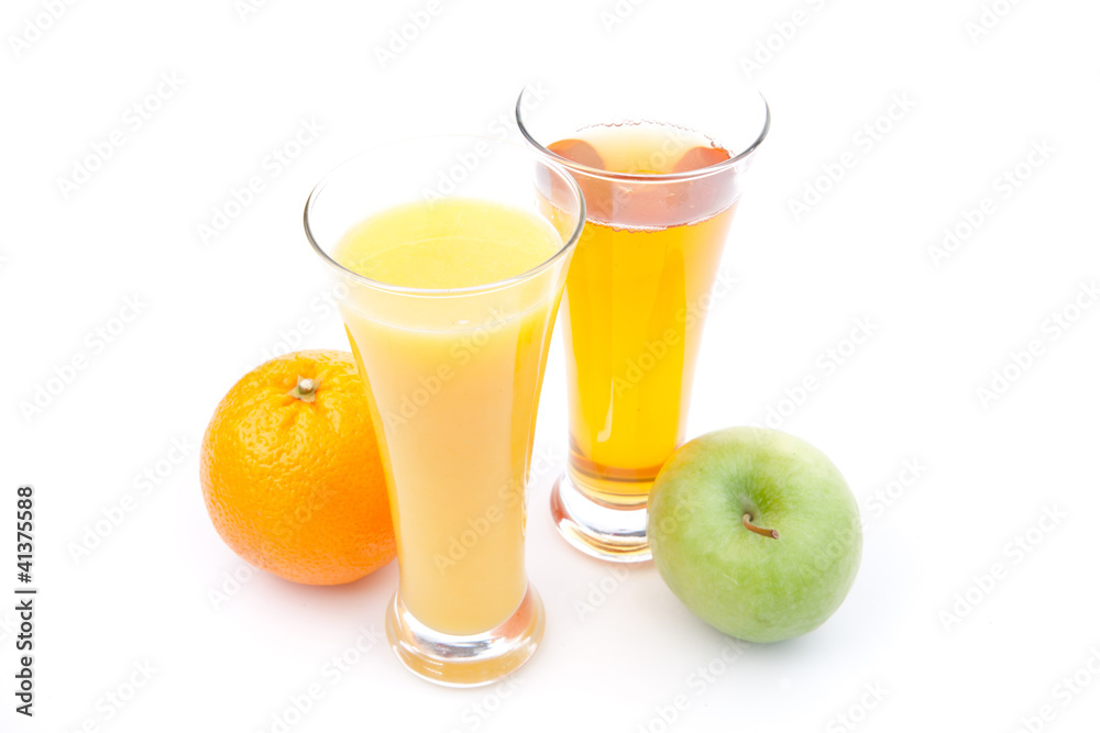 Glass of apple juice near a glass of orange juice Glass of apple juice near a glass of orange juice