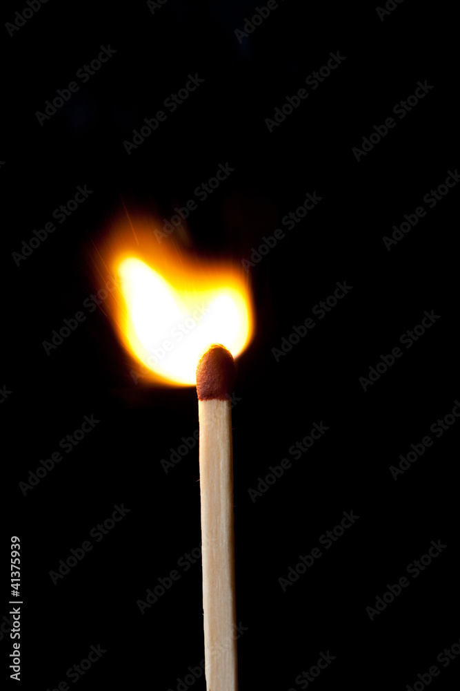 Close up of a match on fire Close up of a match on fire