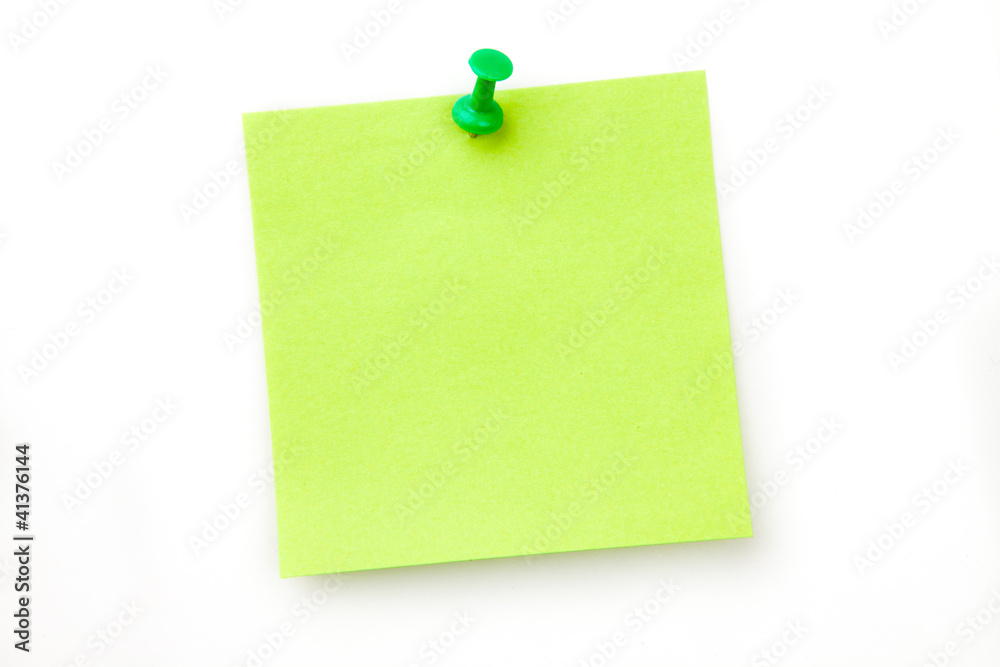 Green pinned adhesive note Green pinned adhesive note