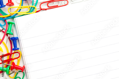 Notepad with large group of muti coloured stationery