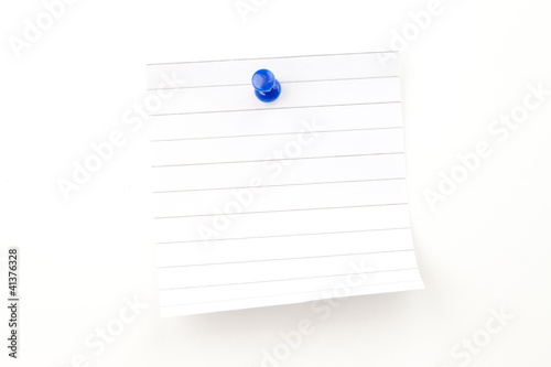 Blank paper with blue pushpin