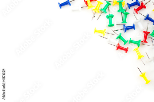 Large group of multi coloured pushpins on the side