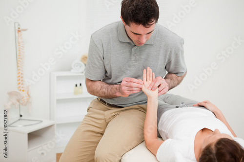 Brunette woman lying on a medical table