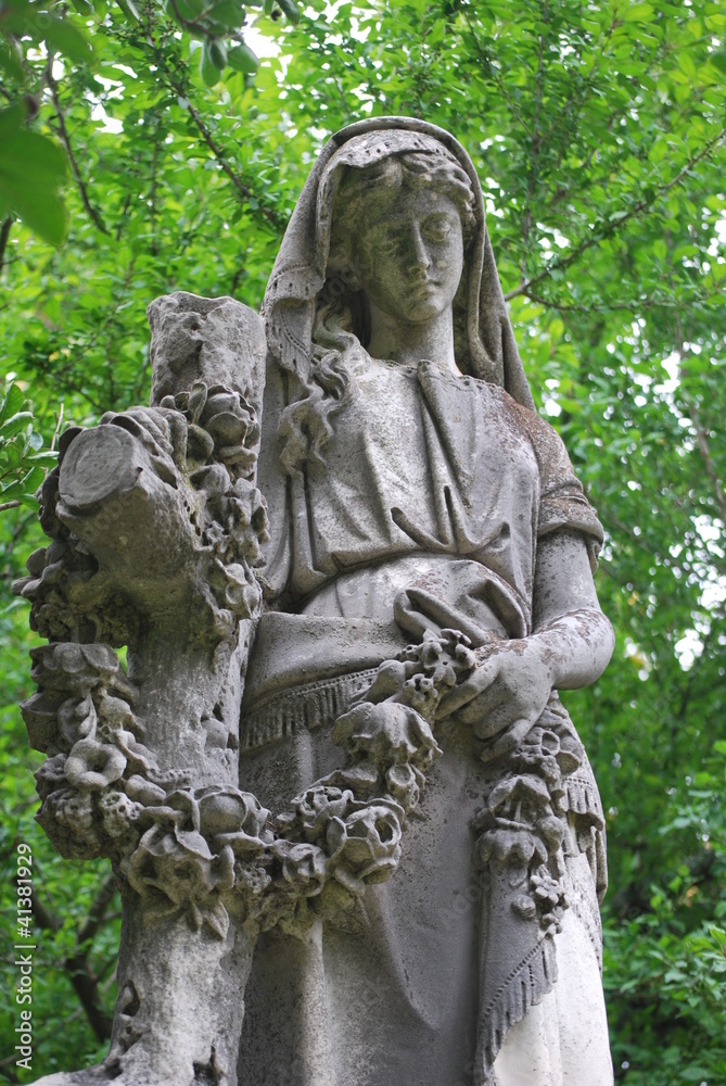 Fototapeta premium Historical cemetery statue by Jackie DeBusk