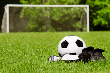 Child soccer or football gear on field