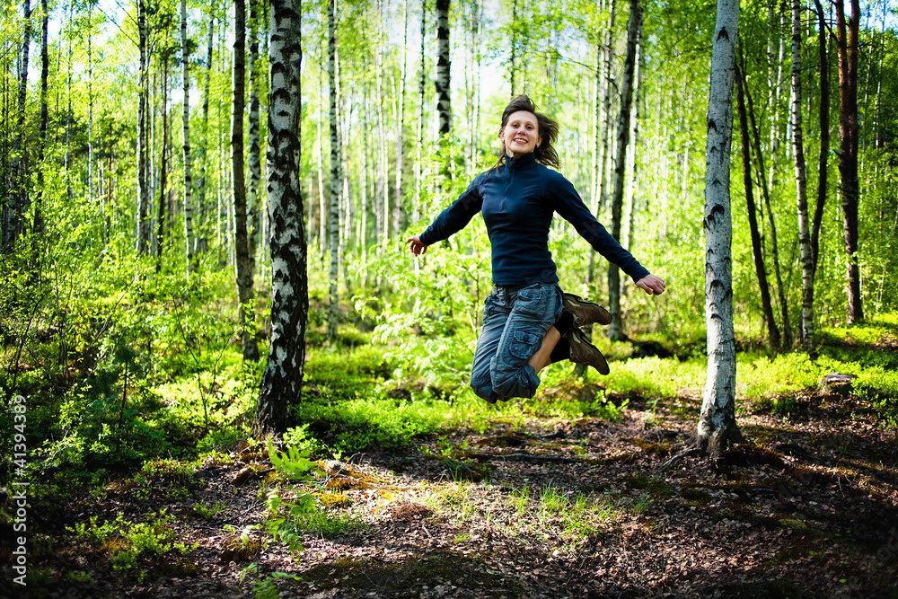 Beautiful young woman jumping Beautiful young woman jumping