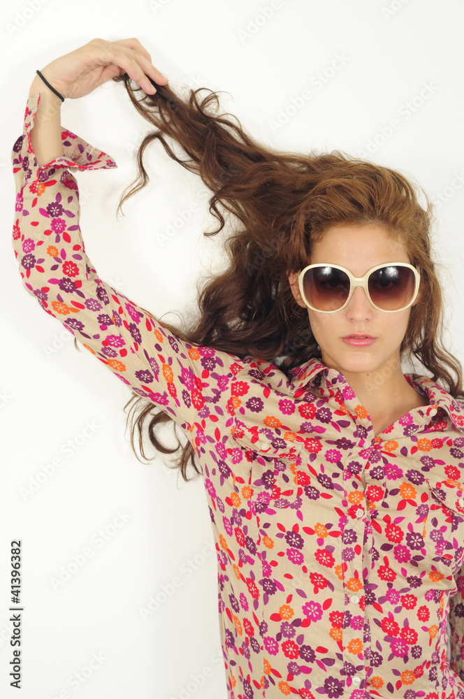 Caucasian female model with long hair and sunglasses Caucasian female model with long hair and sunglasses