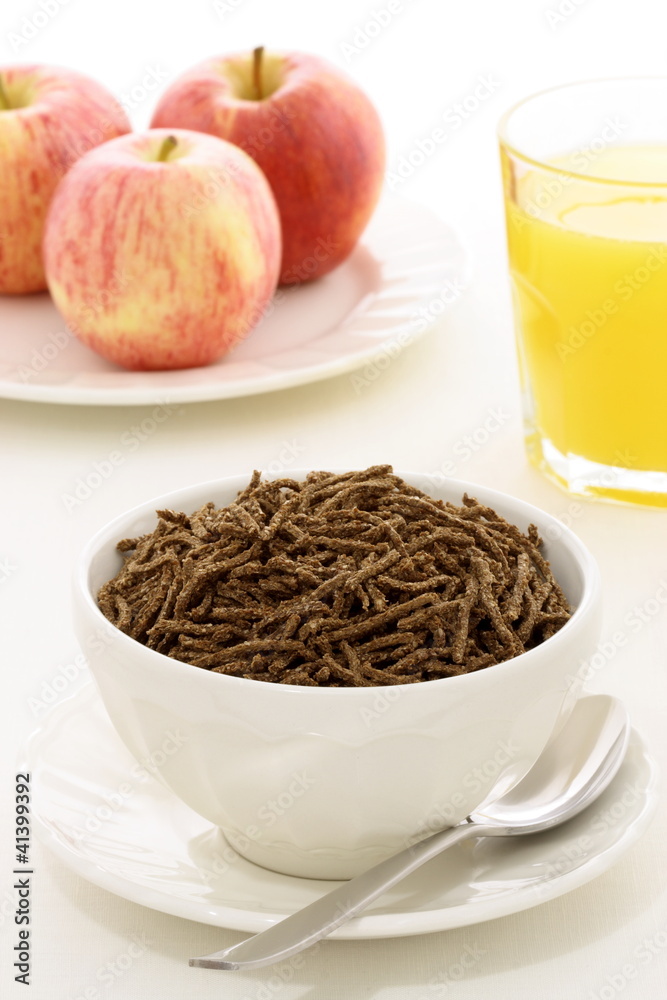 breakfast with fresh apple, orange juice and wheat bran cereal breakfast with fresh apple, orange juice and wheat bran cereal