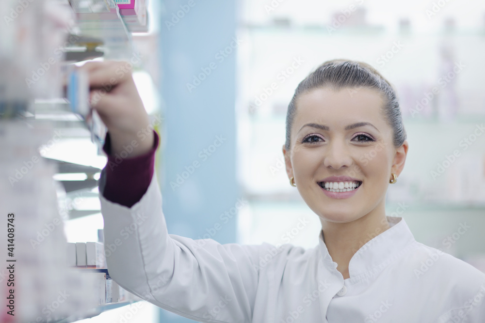 pharmacist chemist woman standing in pharmacy drugstore pharmacist chemist woman standing in pharmacy drugstore
