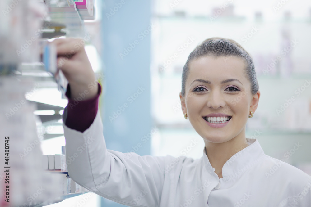 pharmacist chemist woman standing in pharmacy drugstore pharmacist chemist woman standing in pharmacy drugstore
