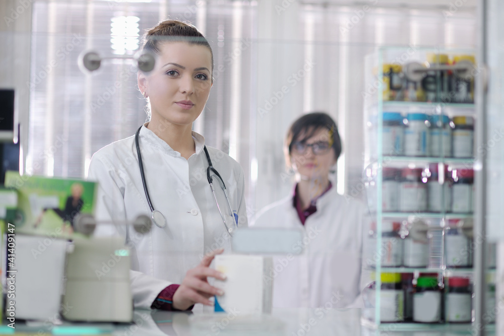 team of pharmacist chemist woman in pharmacy drugstore team of pharmacist chemist woman in pharmacy drugstore