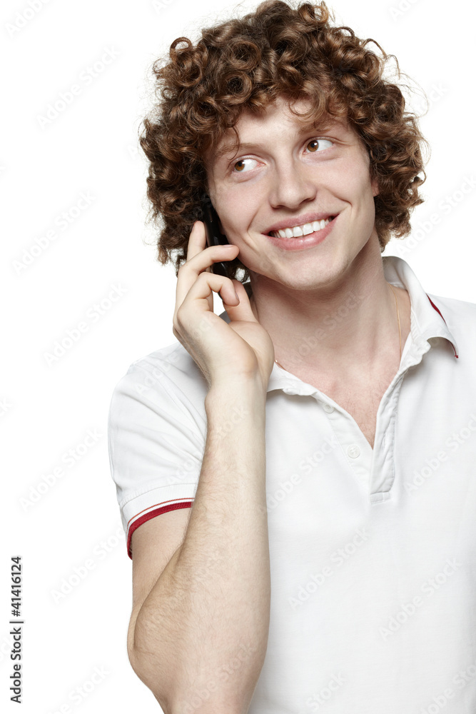 Happy man answering the phone against white background Happy man answering the phone against white background