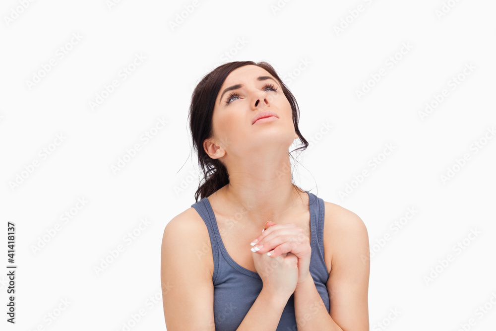 Young woman praying Young woman praying