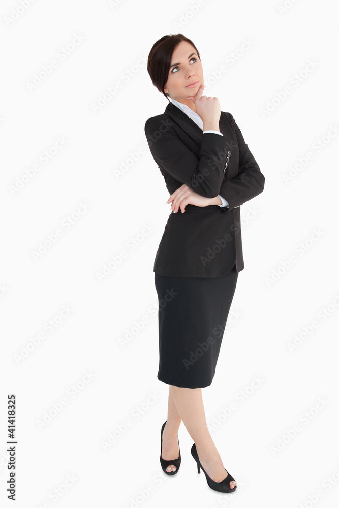 Woman in black suit thinking Woman in black suit thinking
