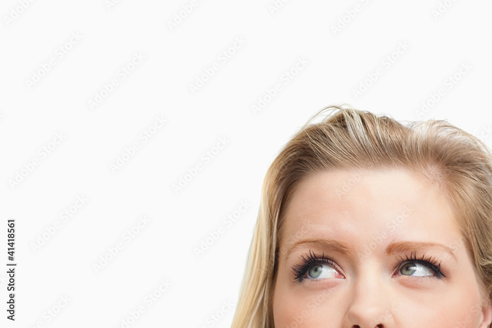 Blonde woman looking towards the side Blonde woman looking towards the side