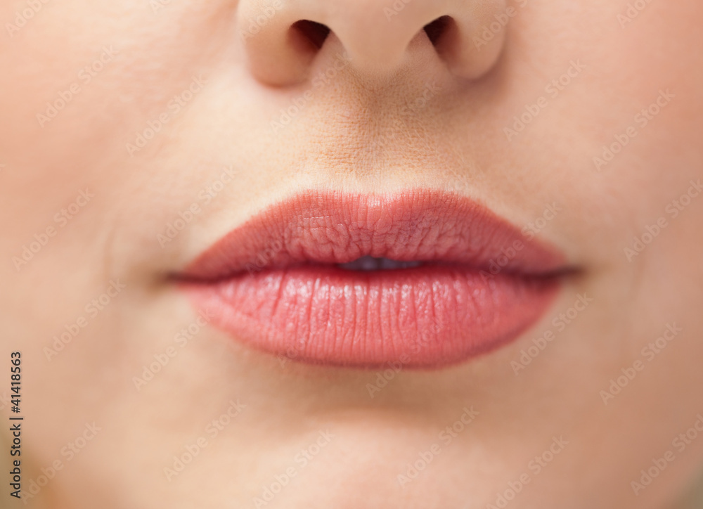 Close-up of lips with lipstick on them Close-up of lips with lipstick on them