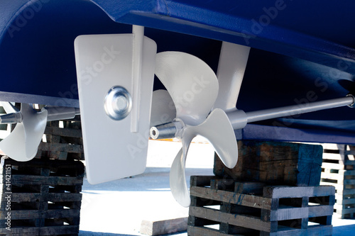 gray painted propeller and steering with zinc anodes