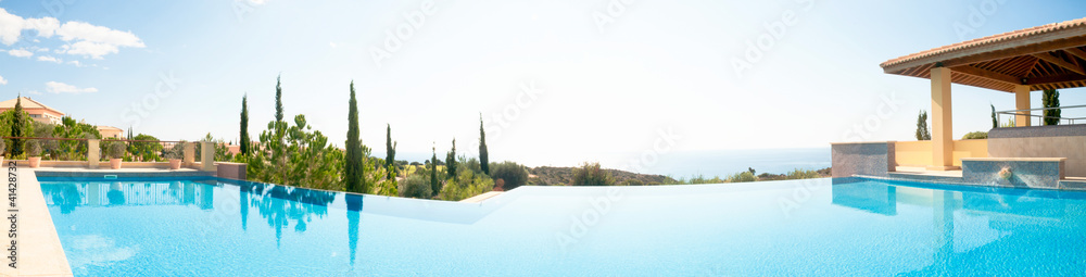 Luxury swimming pool. Panoramic image