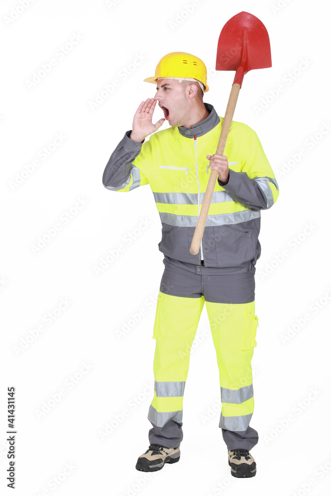 Manual worker with shovel shouting Manual worker with shovel shouting