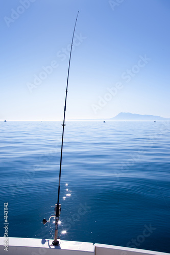 boat fishing rod in mediterranean blue sea