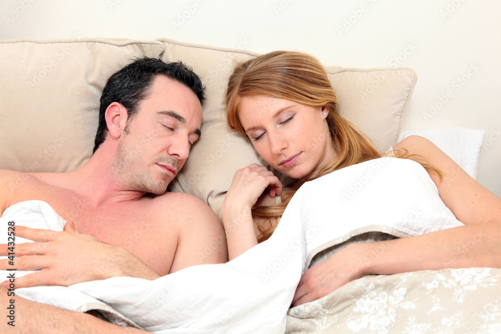 Couple asleep in bed Couple asleep in bed