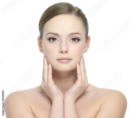 Beautiful face of young woman with clean skin