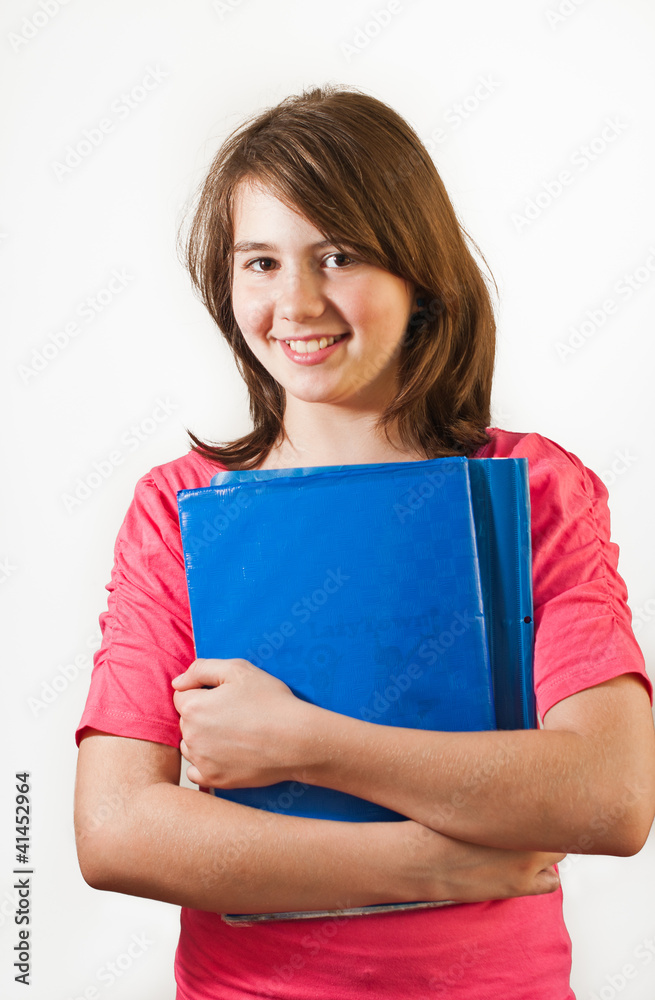 Portrait of teen girl holds books isolated on white background Portrait of teen girl holds books isolated on white background