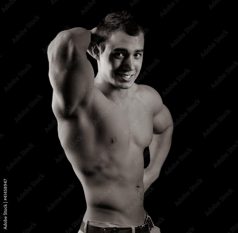 Fototapeta premium Bodybuilder showing his muscles