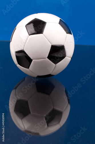 football on blue background