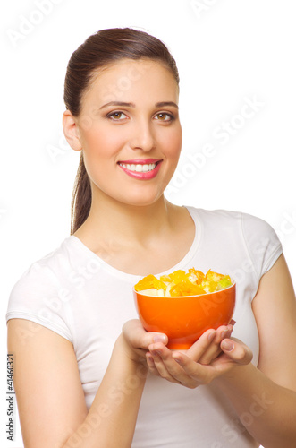 Young girl with fruit salad