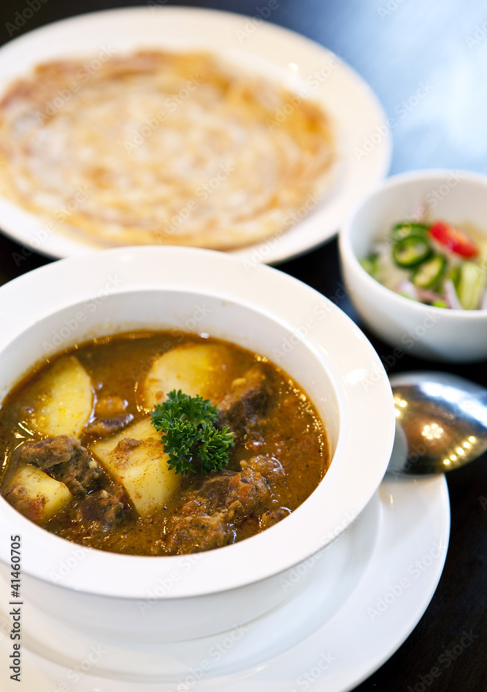 Thai curry with beaf, roti called Musmun Thai curry with beaf, roti called Musmun