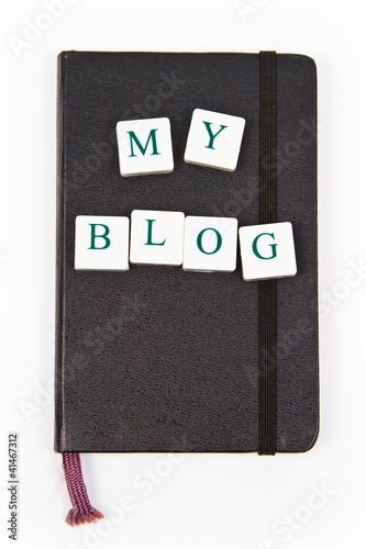 black notepad with my blog message