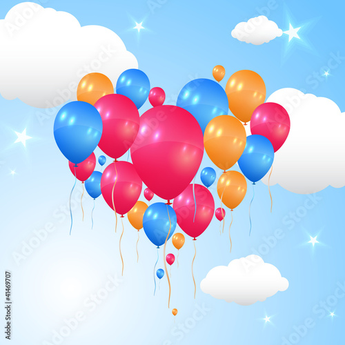 Balloons forming a heart flying in the air