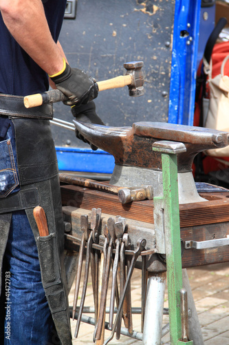 Fotografie Farrier making a horseshoe