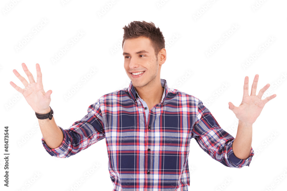 man pushing with his palms an imaginary keyboard man pushing with his palms an imaginary keyboard