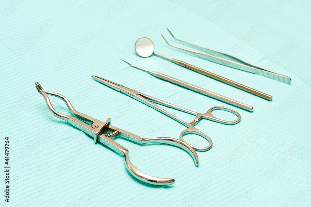 Fototapeta premium Set of metal medical equipment tools for teeth dental care