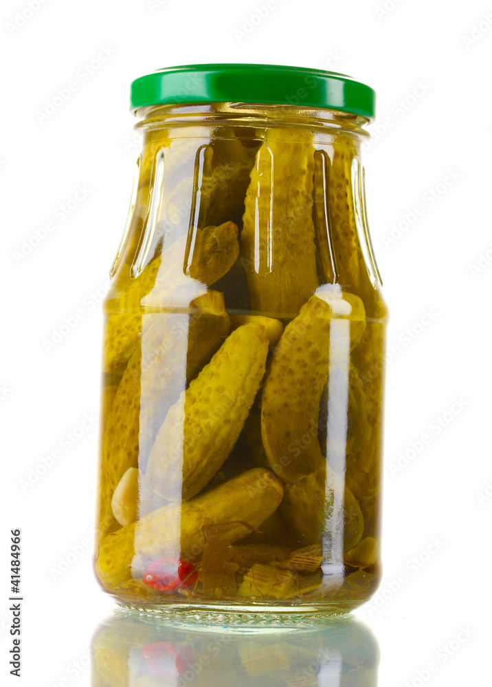 Marinated cucumbers in a glass jar isolated on white