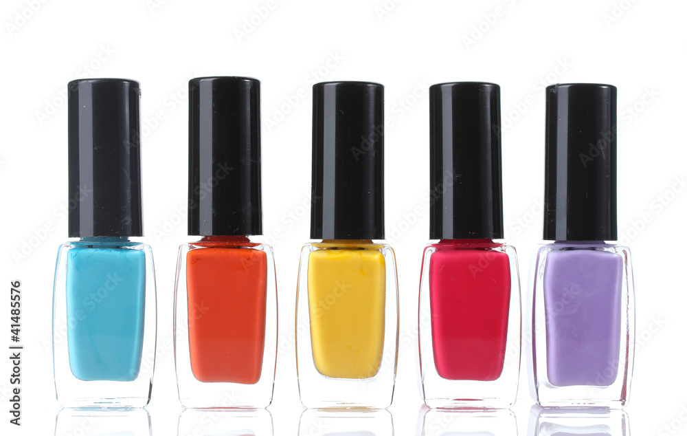 Group of bright nail polishes isolated on white Group of bright nail polishes isolated on white