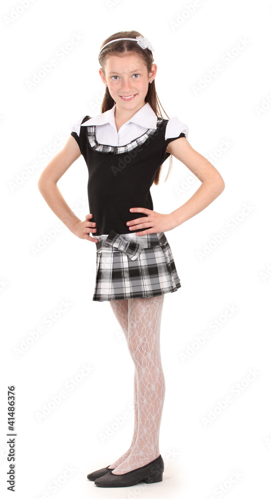 Fototapeta premium beautiful little girl in school uniform isolated on white