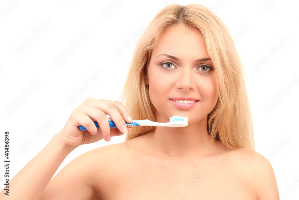 Attractive young woman with a toothbrush Attractive young woman with a toothbrush