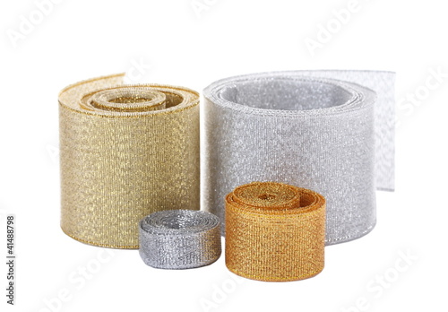 beautiful golden and silver ribbons isolated on white