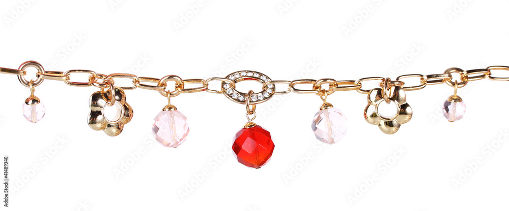 Beautiful golden bracelet with precious stones isolated on white