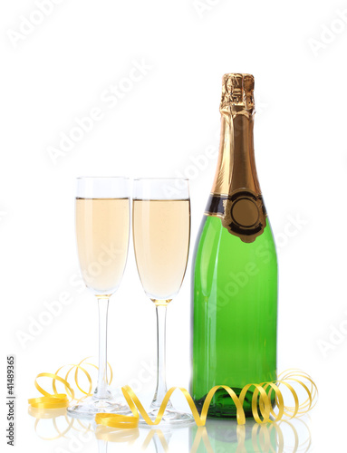glasses and bottle of champagne and serpentine isolated