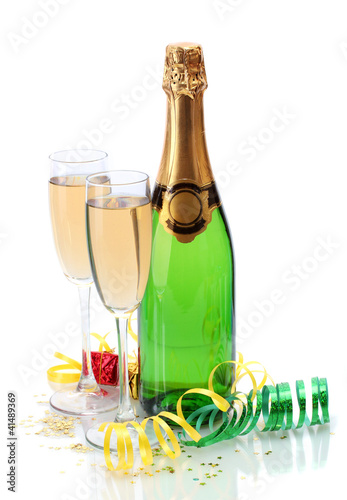 glasses and bottle of champagne, gifts and serpentine isolated